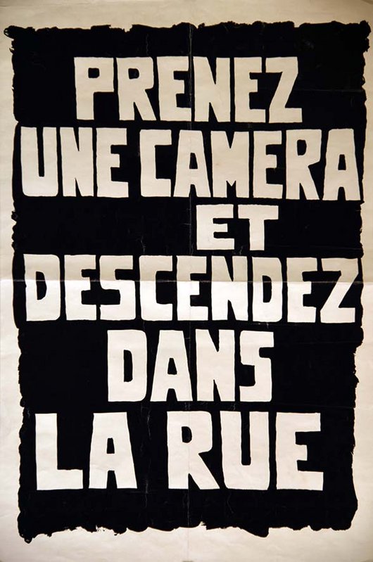Slogan "Prenez une caméra et descendez dans la rue"