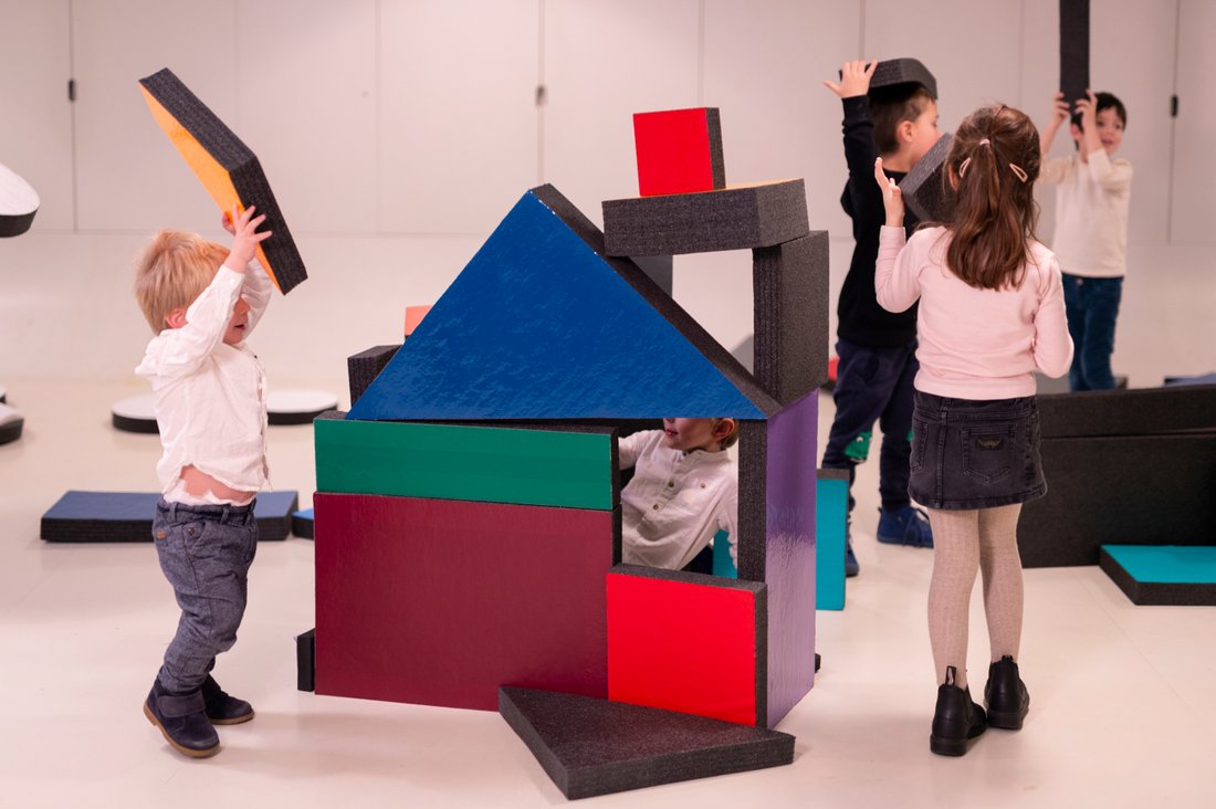 Children's workshops - children building a house